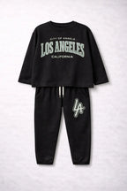 Black sweatshirt and pants set with 'Los Angeles California' text on a light gray background