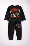 Black pajama set with 'Cappuccino Assassino' design on a light gray background