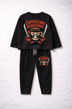 Black pajama set with 'Cappuccino Assassino' design on a light gray background