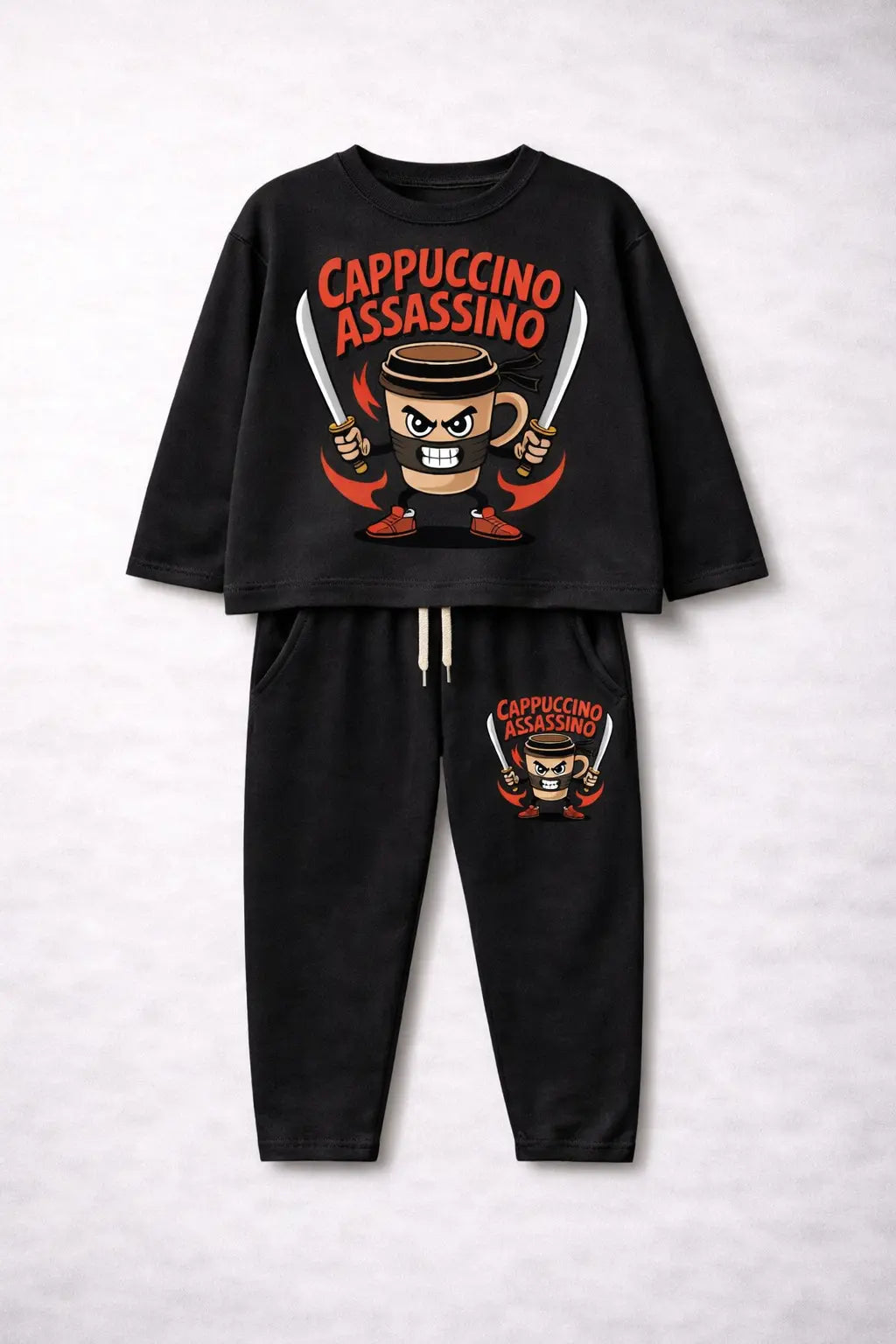 Black pajama set with 'Cappuccino Assassino' design on a light gray background