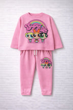 Pink children's pajama set with cartoon characters on a white background